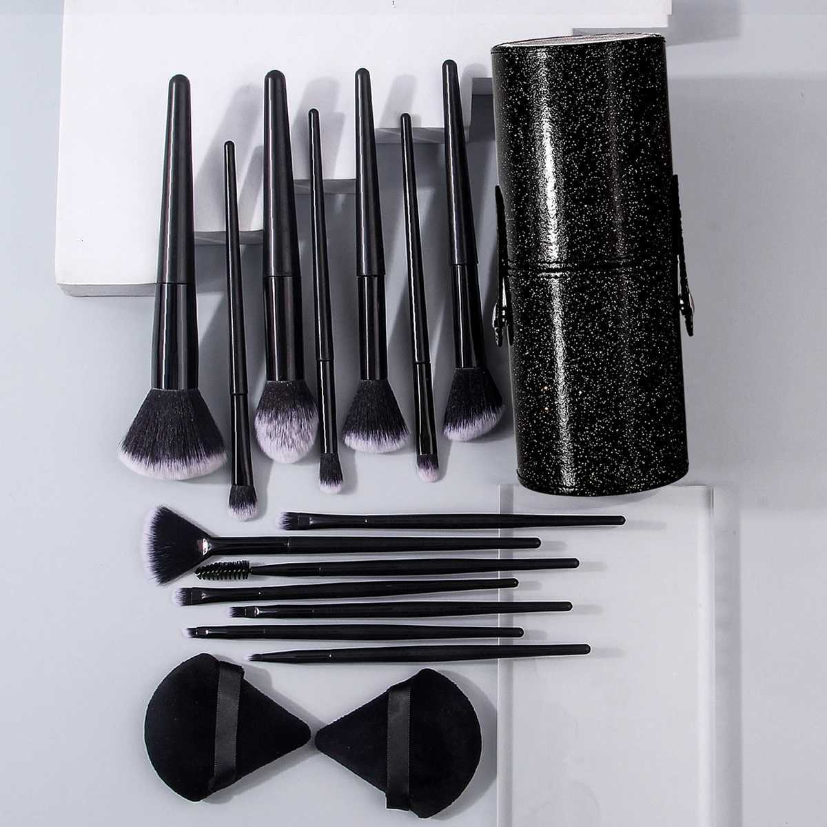 A set of 14 high-quality multi-purpose facial makeup brushes 2 soft triangular powder puffs 1 portable storage bucketT251205
