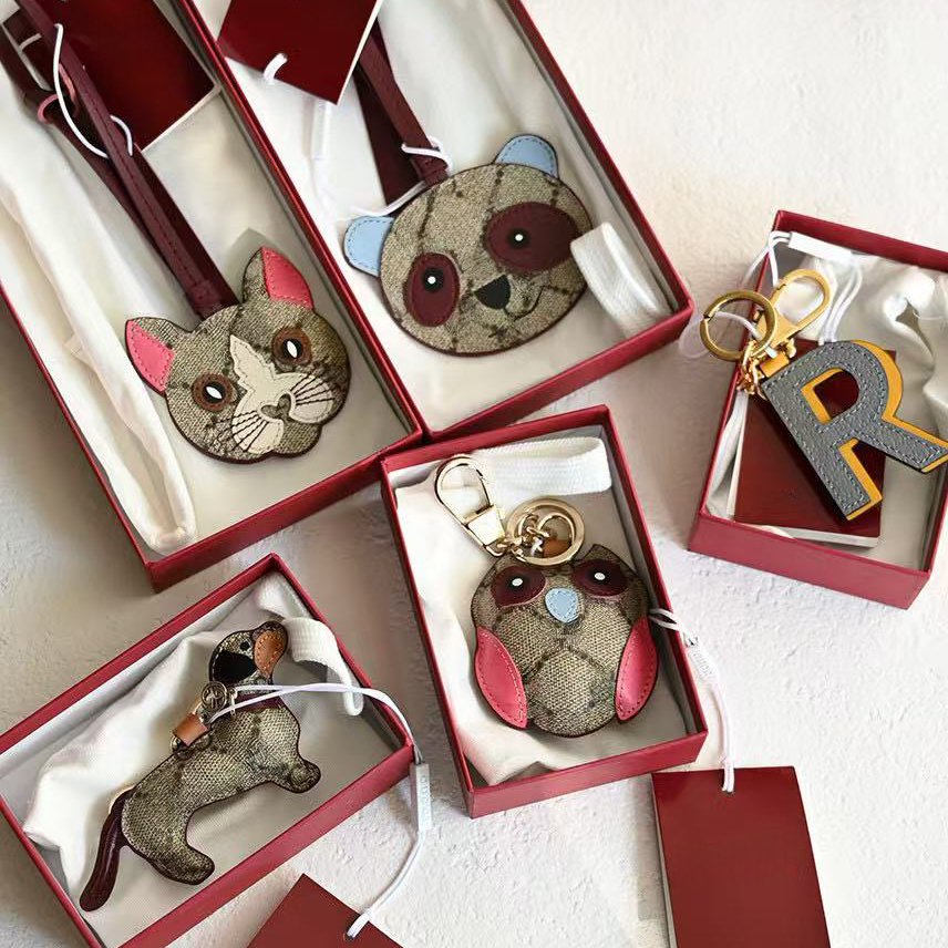 Bag Charm Designer Dog Owl Butterfly Keychains Keyring Woman Mans Luxury Animal Bag Charms Gold Toned Classic Charms Car Accessories High Quality With Box