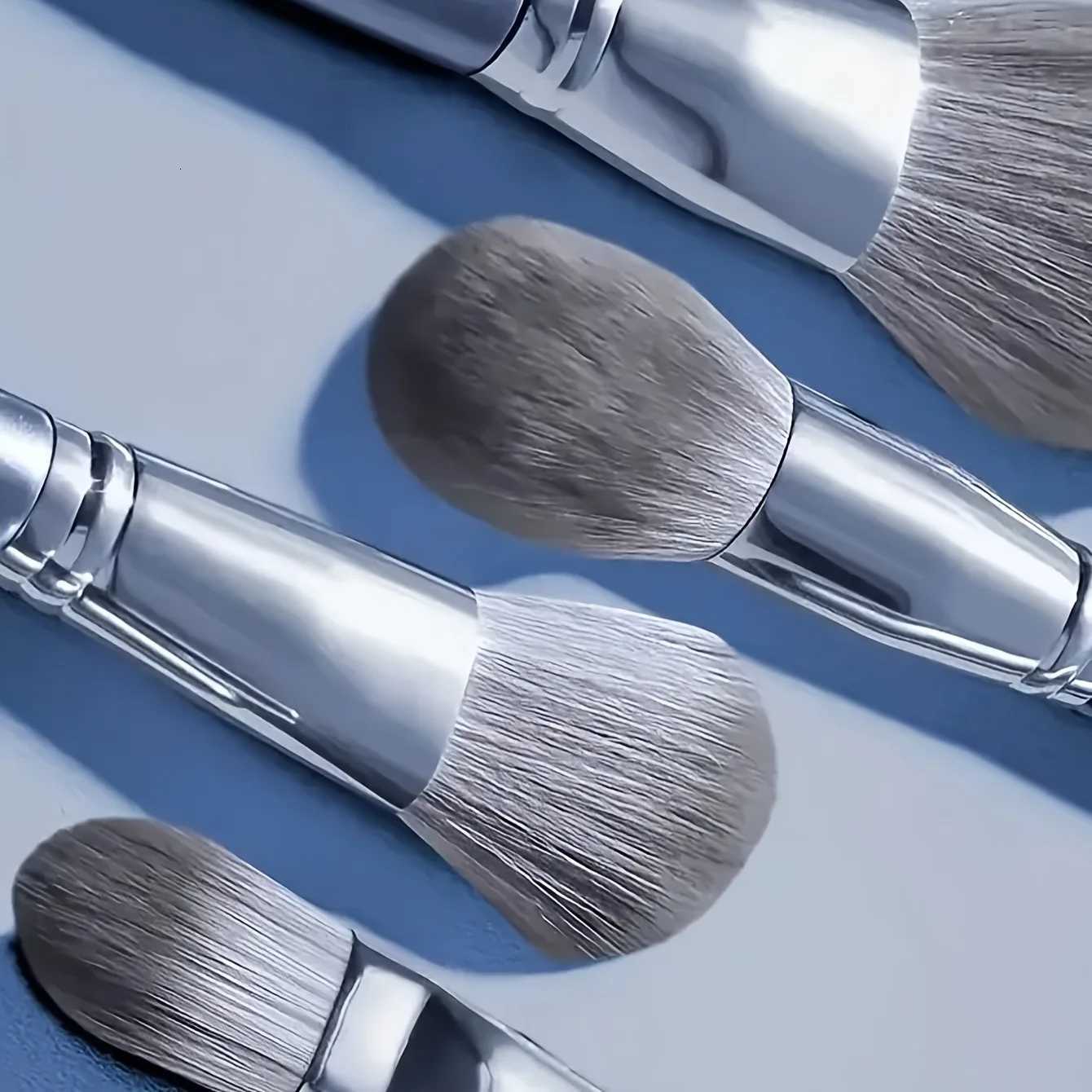 14-Piece Silver Professional Makeup Brush Set Includes 2 Plush Velvet Puffs 2 Blending Sponges Vegan Cruelty-Free Brush CoT251205