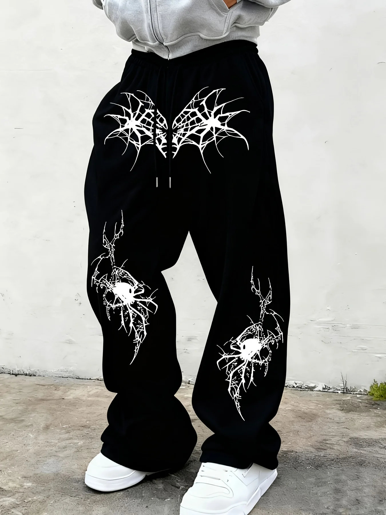 Mens black wide leg jogging pants with spider web print and skull spider pattern on the knees gothic street pants sweatpants 251205
