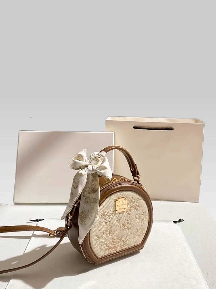 Retro and Luxury Circular Handbag with Contrast Color and Embroidery Printing Flower Womens Portable and Fashion Crossbody BagT251205