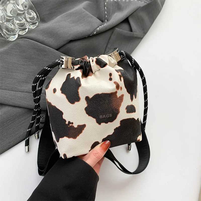 New Cow Pattern Womens Bag Fashion Drawstring Bucket Bag Texture Brand Design Crossbody Bag Simple Versatile Cute Storage BagT251206