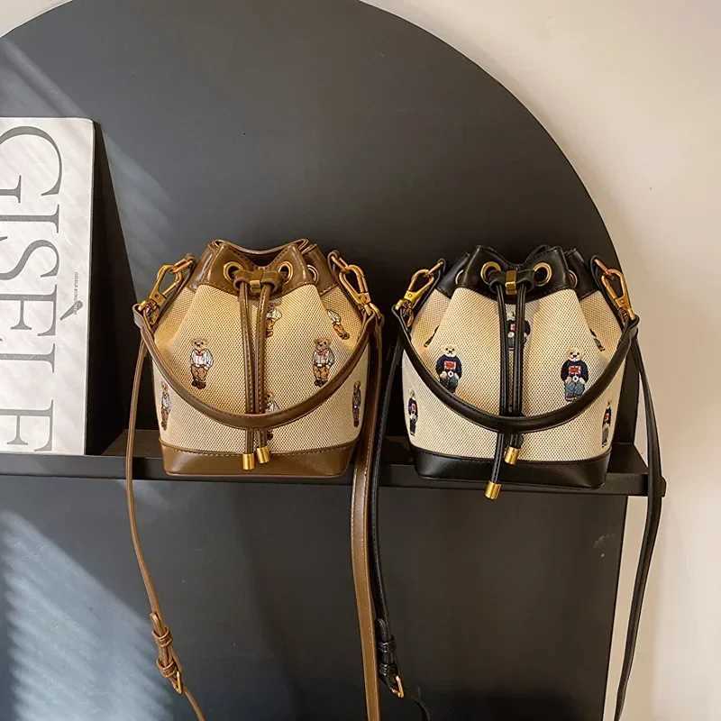 2025 New Retro Womens Bucket Bag - Collision-Color Bear Embroidery Small Bag Durable Canvas Simple Casual TrendyT251206