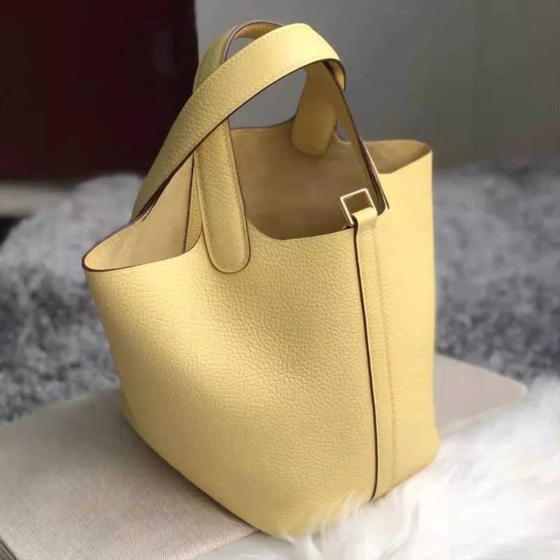 New Summer 2025 genuine leather bucket womens bag casual and fashionable TOGO top-grain cowhide hand-held vegetable basket bag K251206