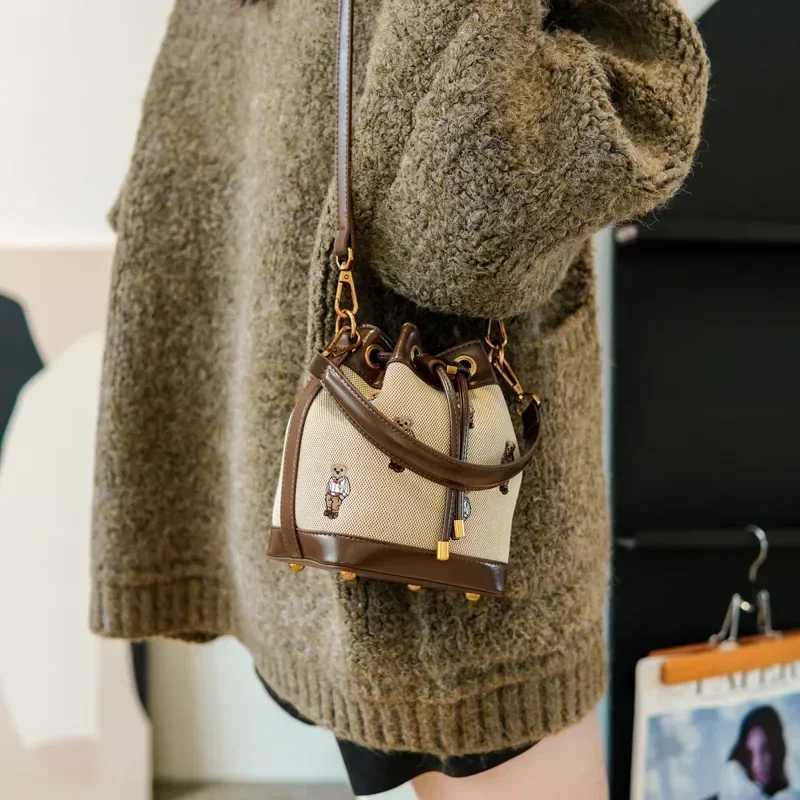2025 New Retro Womens Bucket Bag - Collision-Color Bear Embroidery Small Bag Durable Canvas Simple Casual TrendyT251206