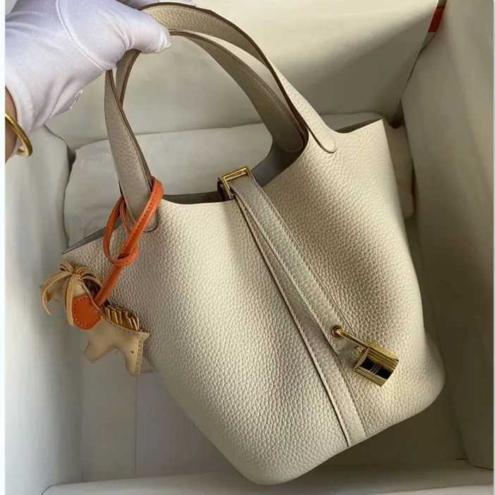 New Summer 2025 genuine leather bucket womens bag casual and fashionable TOGO top-grain cowhide hand-held vegetable basket bag K251206