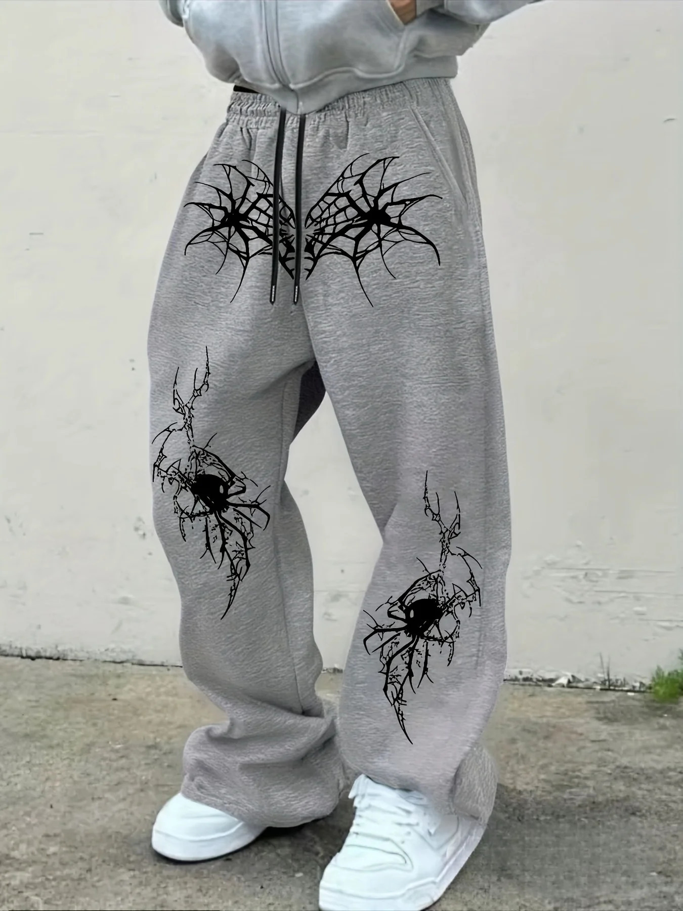 Mens black wide leg jogging pants with spider web print and skull spider pattern on the knees gothic street pants sweatpants 251205
