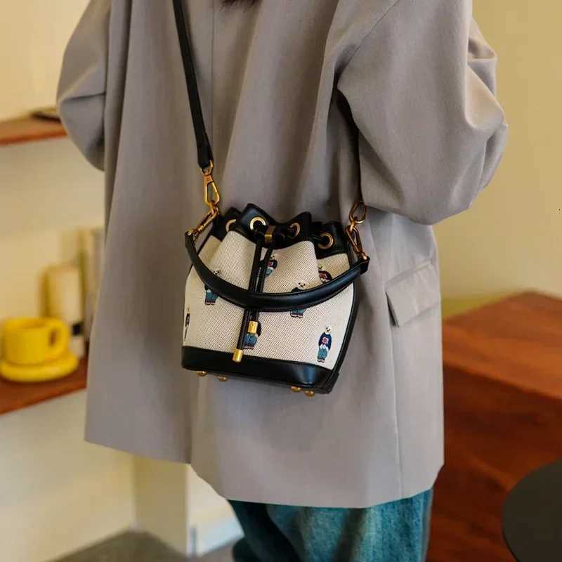 2025 New Retro Womens Bucket Bag - Collision-Color Bear Embroidery Small Bag Durable Canvas Simple Casual TrendyT251206