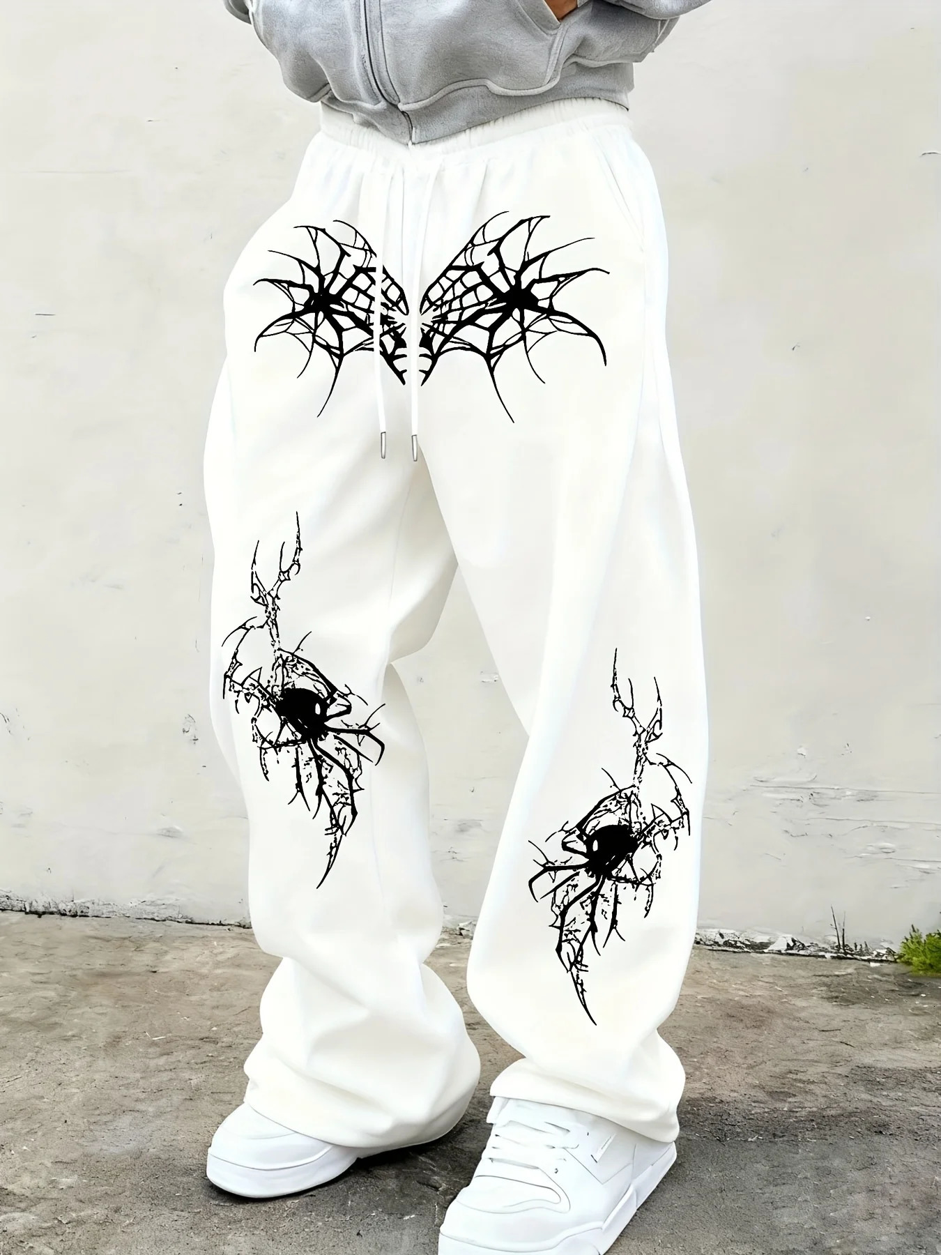 Mens black wide leg jogging pants with spider web print and skull spider pattern on the knees gothic street pants sweatpants 251205