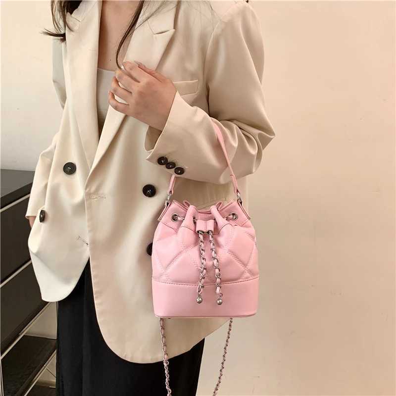 Car sewing bucket bag womens shoulder bag solid color mother bag large capacity 2024 new fashion popular womens bagT251206