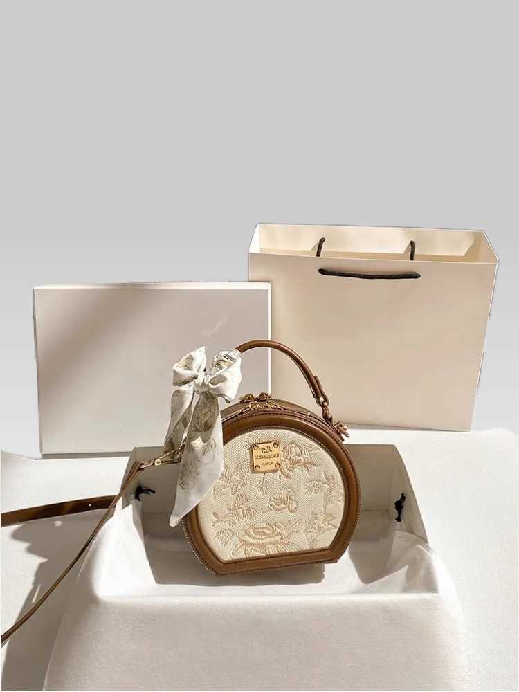 Retro and Luxury Circular Handbag with Contrast Color and Embroidery Printing Flower Womens Portable and Fashion Crossbody BagT251205