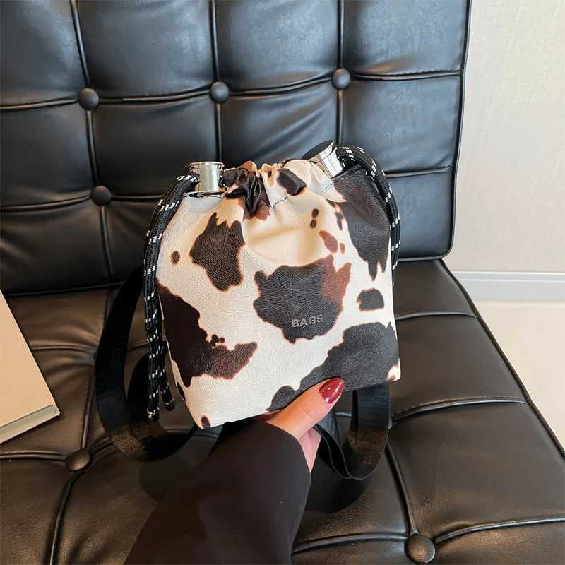 New Cow Pattern Womens Bag Fashion Drawstring Bucket Bag Texture Brand Design Crossbody Bag Simple Versatile Cute Storage BagT251206