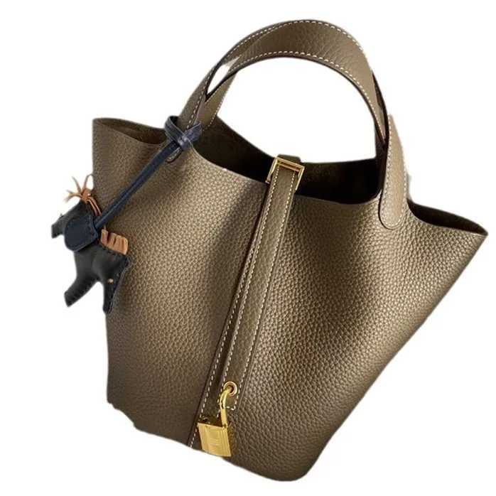 New Summer 2025 genuine leather bucket womens bag casual and fashionable TOGO top-grain cowhide hand-held vegetable basket bag K251206