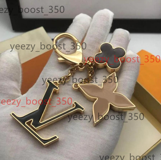 elegant charming flower shaped metal key chain designer keychain chic french style louis vouitton lv lvt vuittonly bag charm auto accessory perfect christmas gift f
