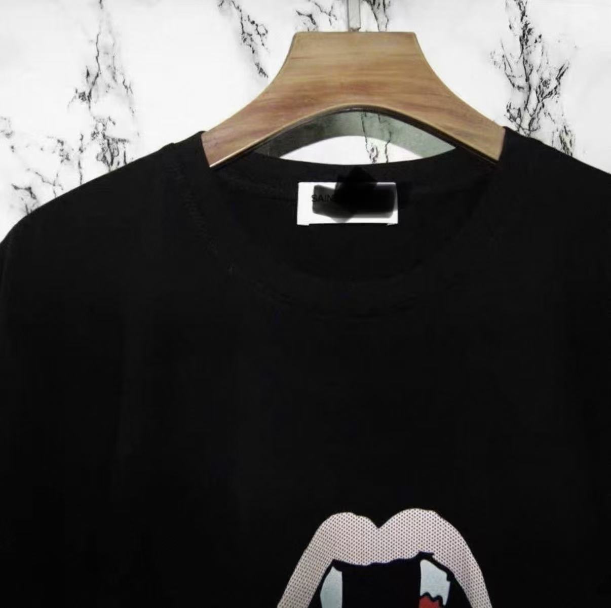 Men's T-Shirts The SAINt-TL T-shirt is in the style of blood teeth