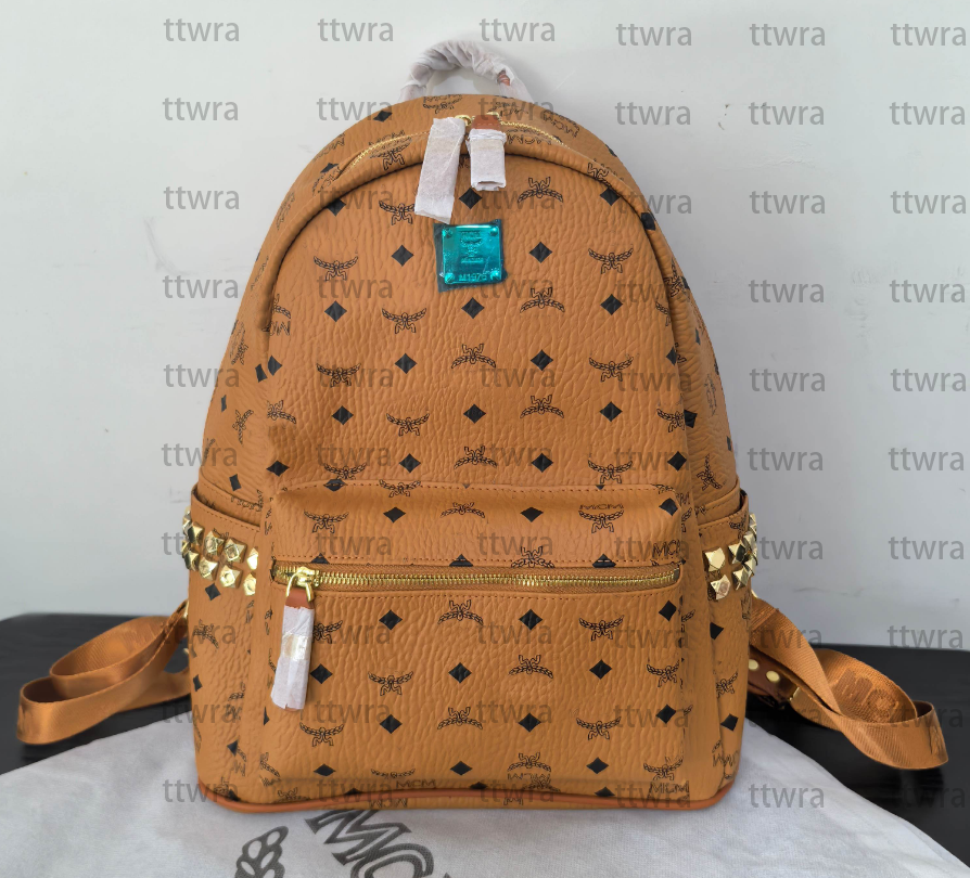 2025 new Leather Handbag Backpack Large Size Men And WomenRivet Printing Lady Bags Boy Girl School Bag Senior Sense High bag 245 0