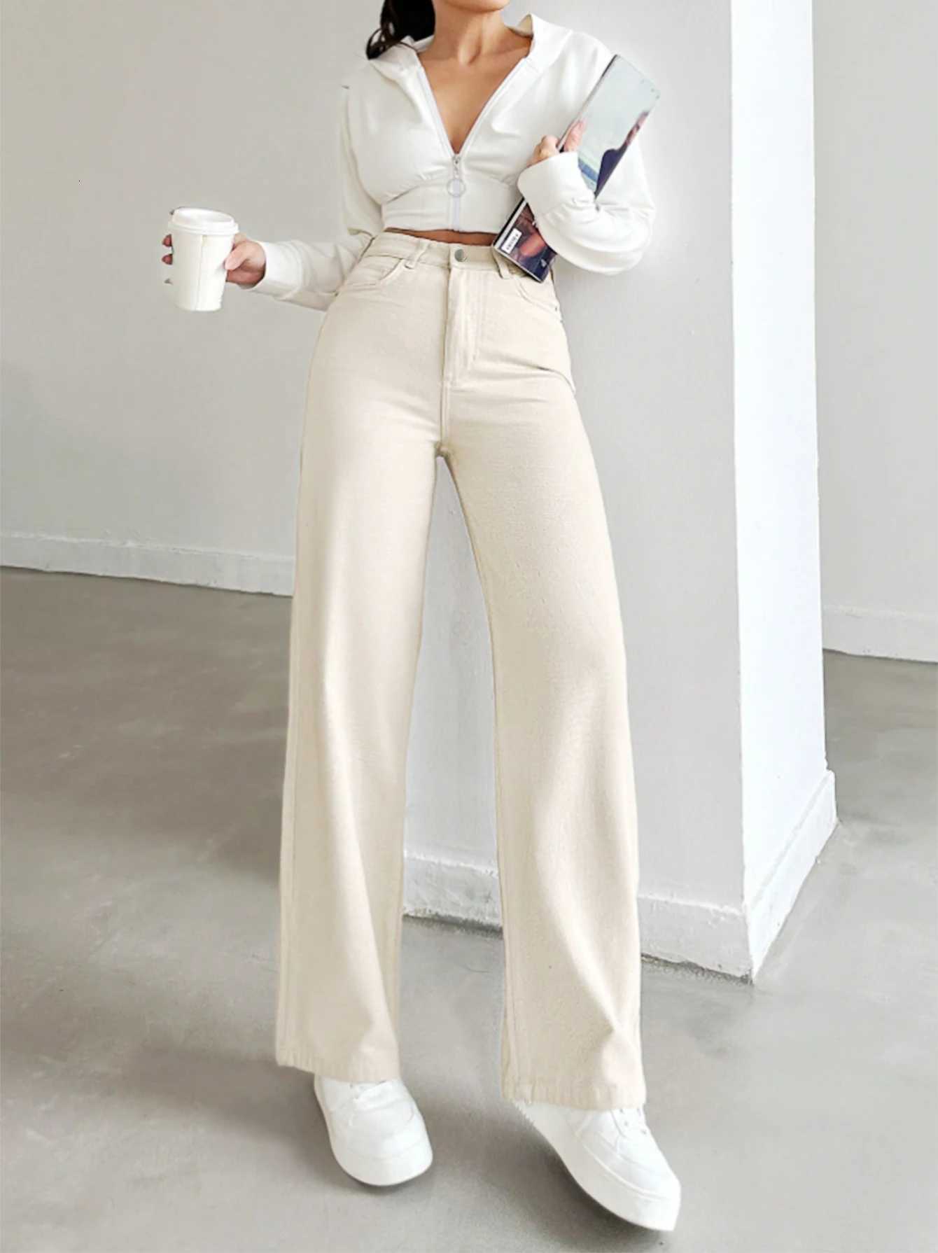 Womens autumn jeans made of cotton denim in a beige apricot color straight-leg slim fit high-waisted elastic waistbandT251208