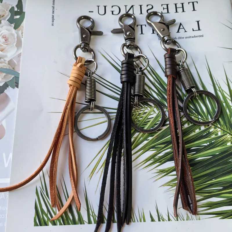 Hot selling Cowhide Weaving Alloy Lobster Buckle Leather Tassel Pendant Keychain Bag Accessories For WomenXJ251208