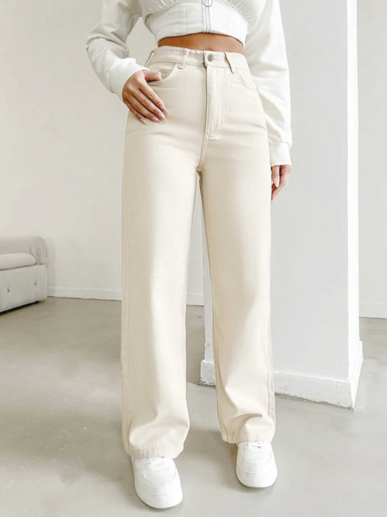 Womens autumn jeans made of cotton denim in a beige apricot color straight-leg slim fit high-waisted elastic waistbandT251208