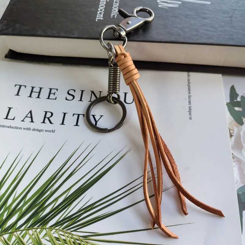 Hot selling Cowhide Weaving Alloy Lobster Buckle Leather Tassel Pendant Keychain Bag Accessories For WomenXJ251208 - view 3