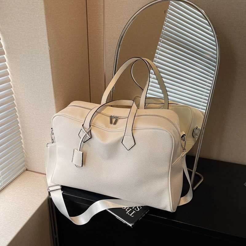 Fi Sense of Luxury Solid PU Travel Bags Large Capacity High Quality Simple Temperament Shoder Bags for Unisex 2025 New Y251209