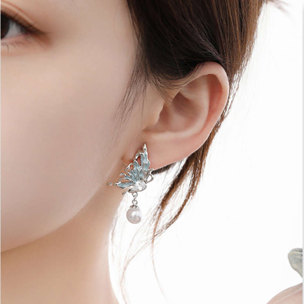 DHcollections Niche Design Ice Blue Butterfly Pearl Stud Wholesale Fresh Sweet 925 Silver Needle Zircon Earrings