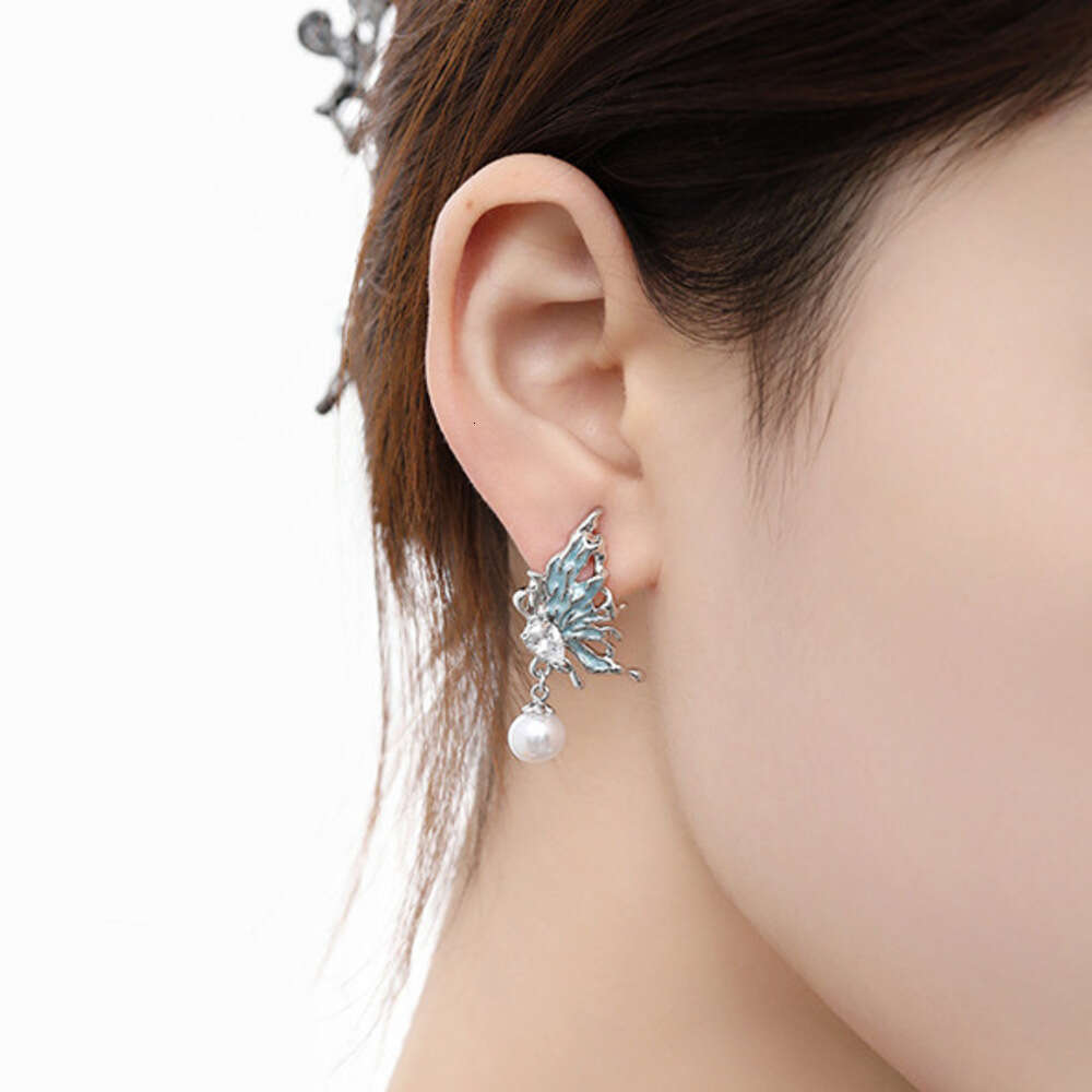 DHcollections Niche Design Ice Blue Butterfly Pearl Stud Wholesale Fresh Sweet 925 Silver Needle Zircon Earrings