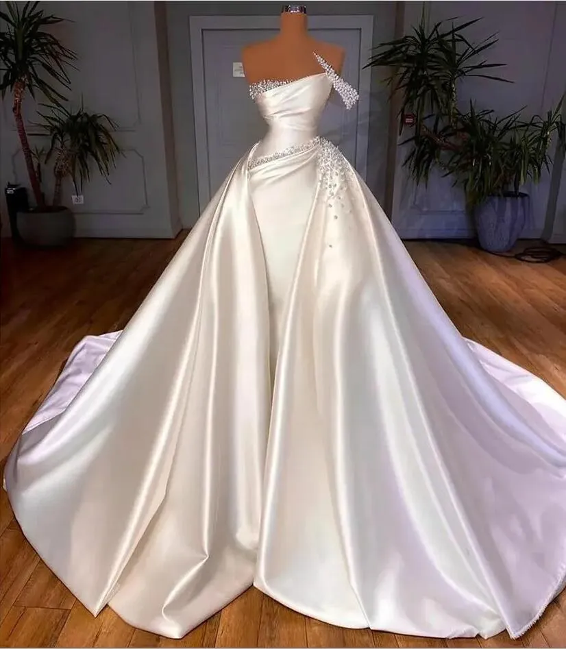 2026 Arabic Aso Ebi Plus Size Ivory Wedding Dresses Sheer Neck Pearls Satin Detachabel Train Luxurious Bridal Gowns Dress For Brides ZJ2059