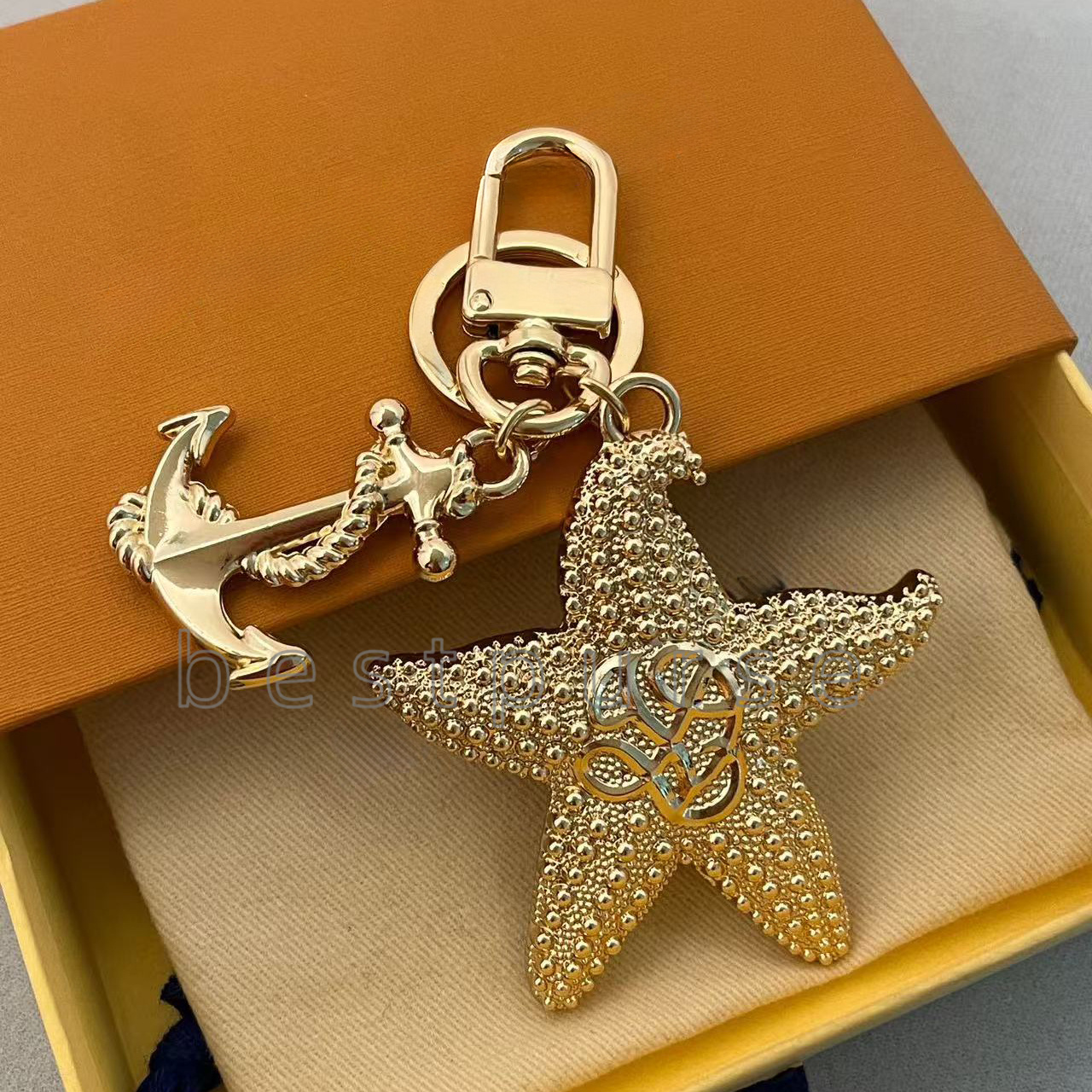 starfish key holder and bag charm for women dice luxury breeze keychain gold color keyring skateboard purse charm cherished tab key holder