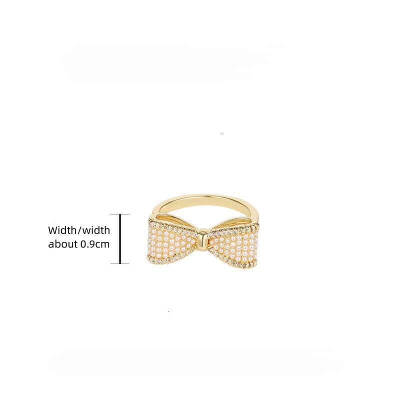 DHcollections Gentle Fairy Style Big Bow Pearl French Retro High-end Light Luxury Versatile Elegant Index Finger Ring for Women