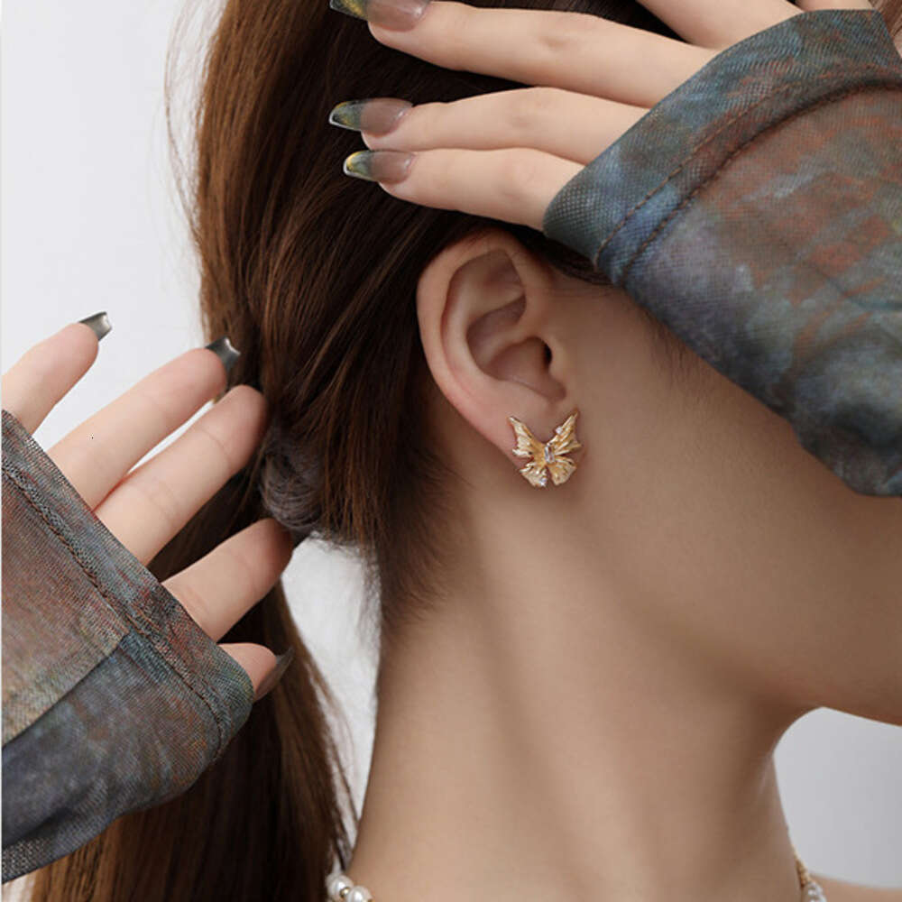 DHcollections 925 Silver Needle gold Butterfly Light Luxury High-end New Original Ins Fashion Commuting Stud Earrings Wholesale