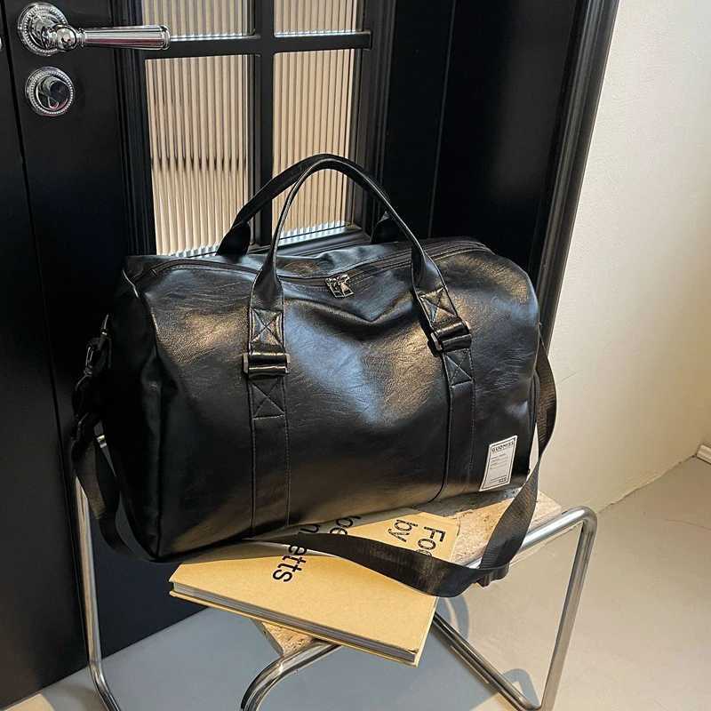 Cross Border Waterproof PU Mens Handheld Large Capacity Short Distance Travel Lage Storage Bag Casual Folding Travel Bag Y251209