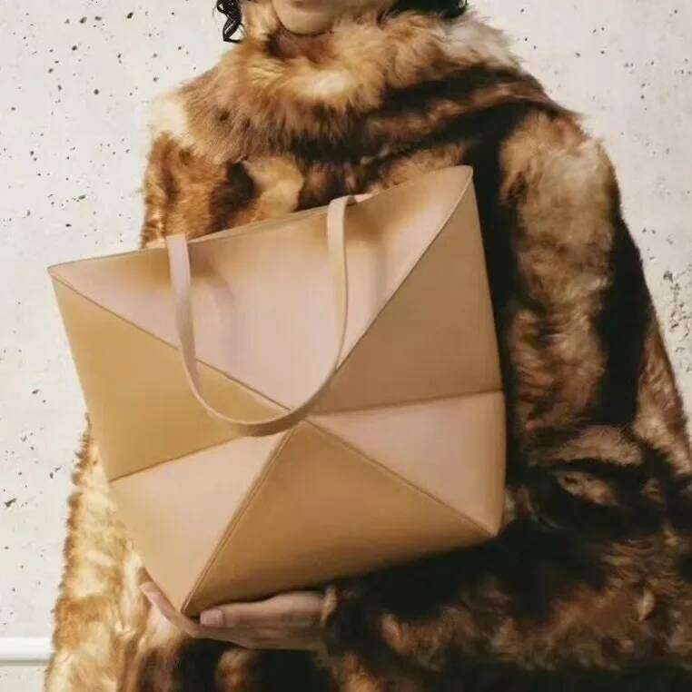 highquality top layer cow leather puzzle foldable tote large capacity haneld bucket bag neutral minimalist style 1100368158