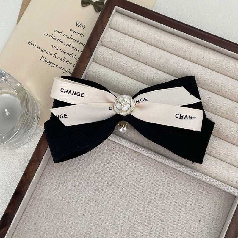 New Pearl Bow Hair Clip for Wen lia wer Hair Tie Heaear Elastic Haiand Korean Hair Accories Ponytail Holder Y251210