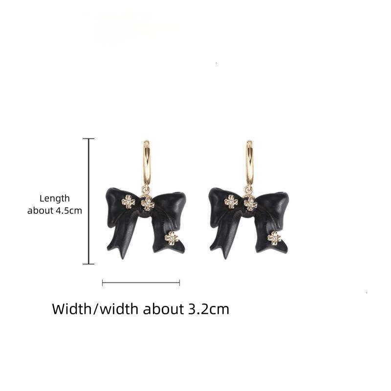 DHcollections Autumn Winter Melad Wooden Bow Earrings for Women, Light Luxury Niche Original Design, Elegant Versatile Clips and Ear Jewelry