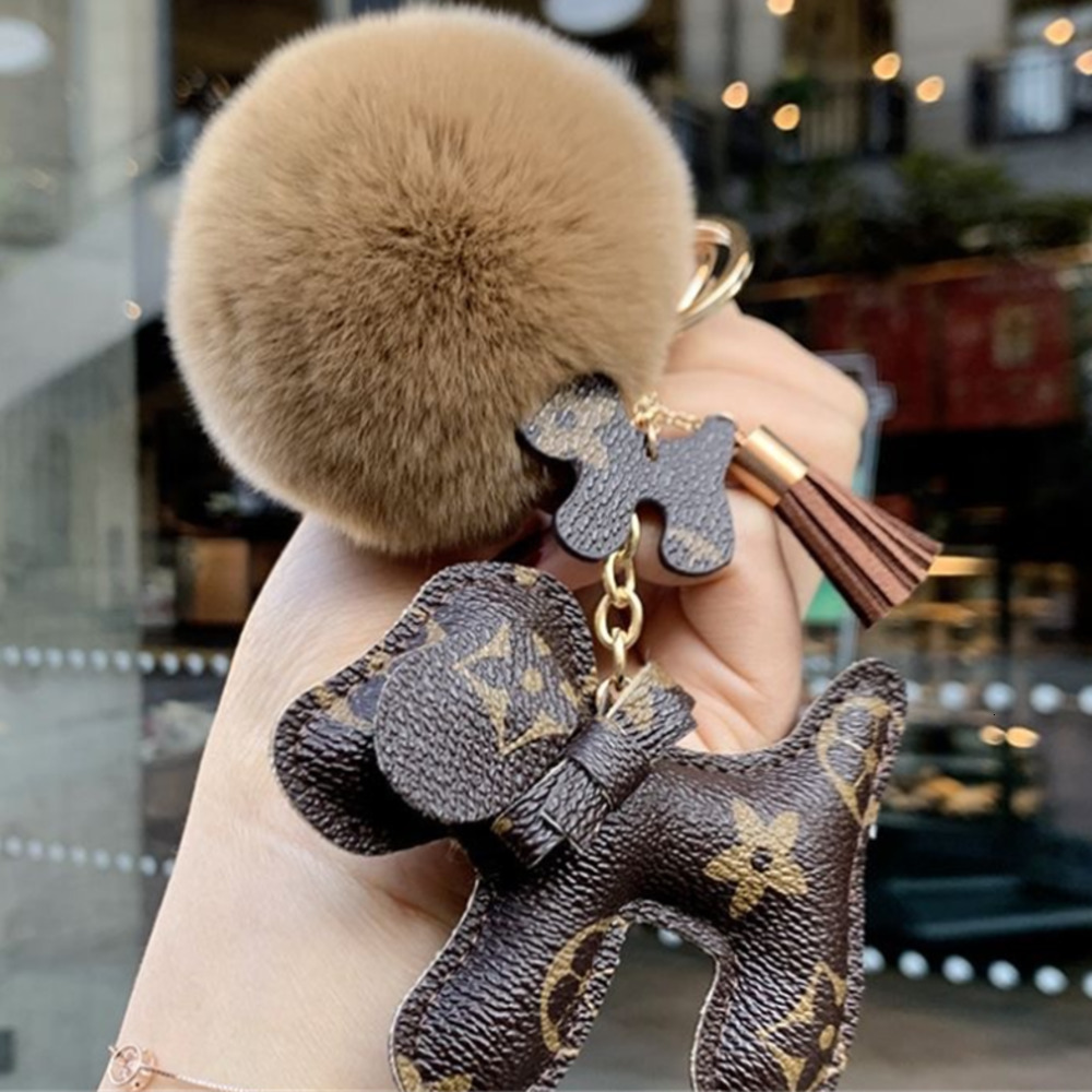 Charm Luxury Keychains Lanyards Designer Keychain Puppy Real Fur Ball Key Chain Car Pendant Metal Fashion Personalized Creative keychain purse Accessories AA Bl