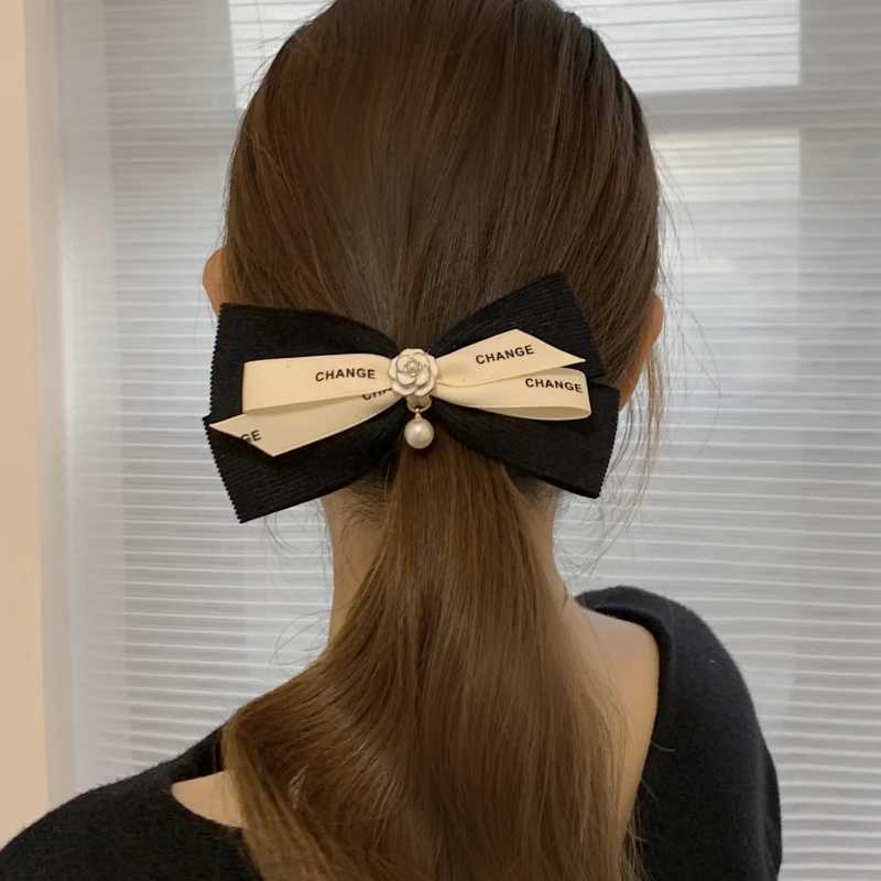 New Pearl Bow Hair Clip for Wen lia wer Hair Tie Heaear Elastic Haiand Korean Hair Accories Ponytail Holder Y251210