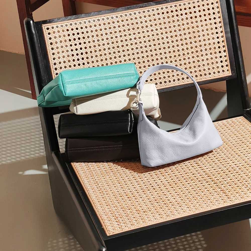 Top layer cowhide underarm bag 2025 new niche design soft genuine leather lazy style fi and cpact wens shoder bag Y251209