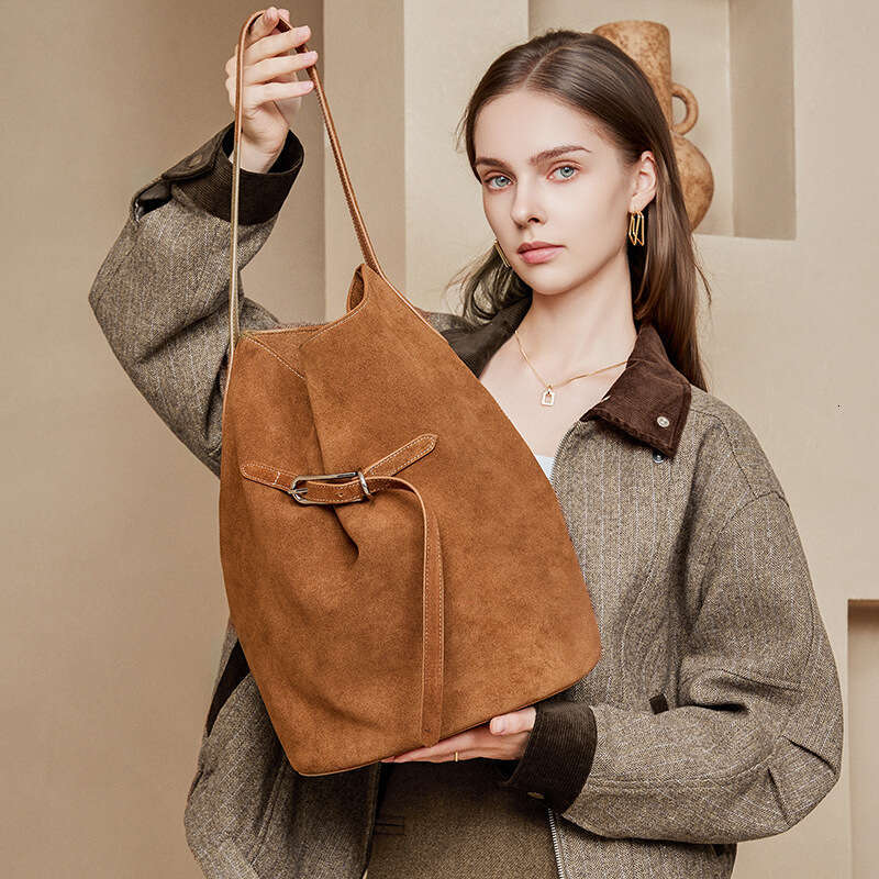 Luxury bag designer Niche Tote from South Korea, fashionable single shoulder top cowhide Beach Bags, large capacity Hobo high-end handheld leather buc