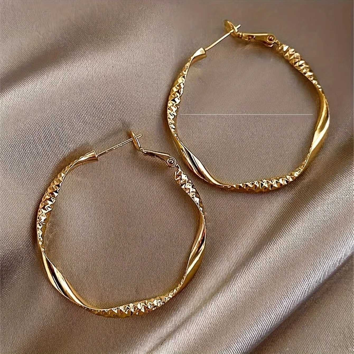 Fashionable and simple round twisted irregular ladies earrings exaggerated girls earrings high-grade plain hoop earringsXJ251210 - view 5