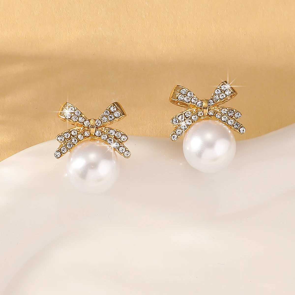 2 Wens Sier Needle Bow Studded With Diamond Pearl Earrings Fashionable And Niche Design High-end And Refreshing Earrings Y251210