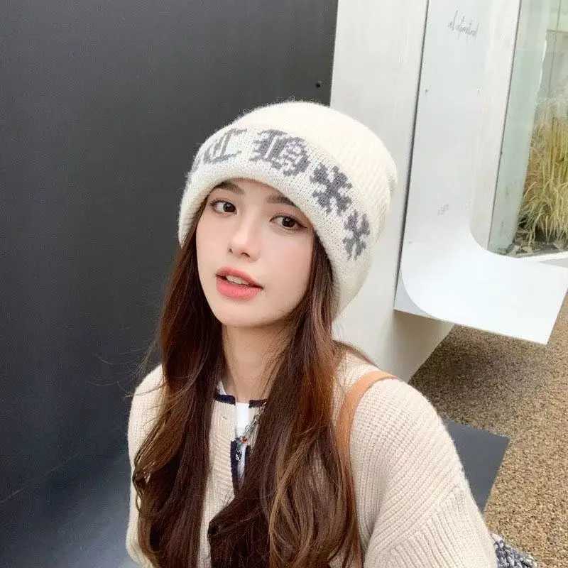 Luxury Thick earmuffs autumn and winter thick knitted hat fashionable jacquard cold proof hat neutral windproof and cold proof hat Y251209