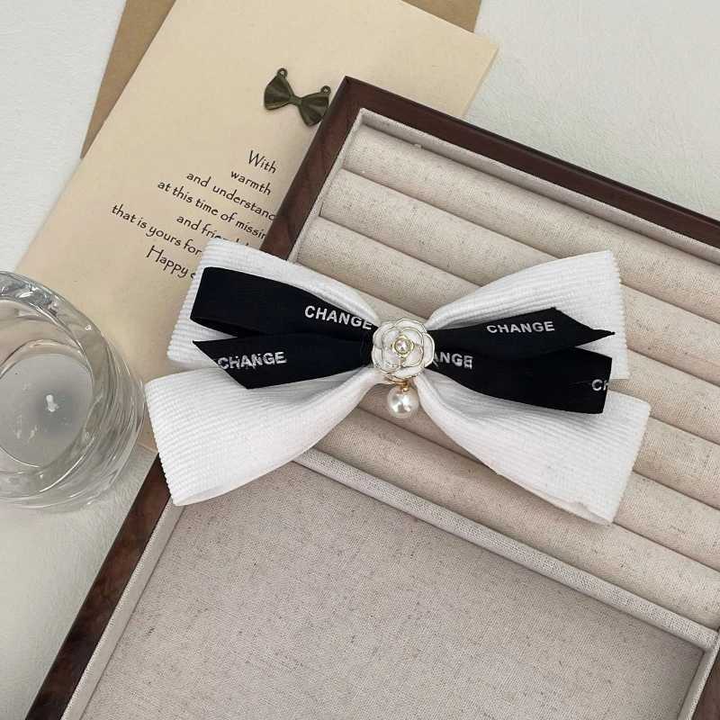 New Pearl Bow Hair Clip for Wen lia wer Hair Tie Heaear Elastic Haiand Korean Hair Accories Ponytail Holder Y251210