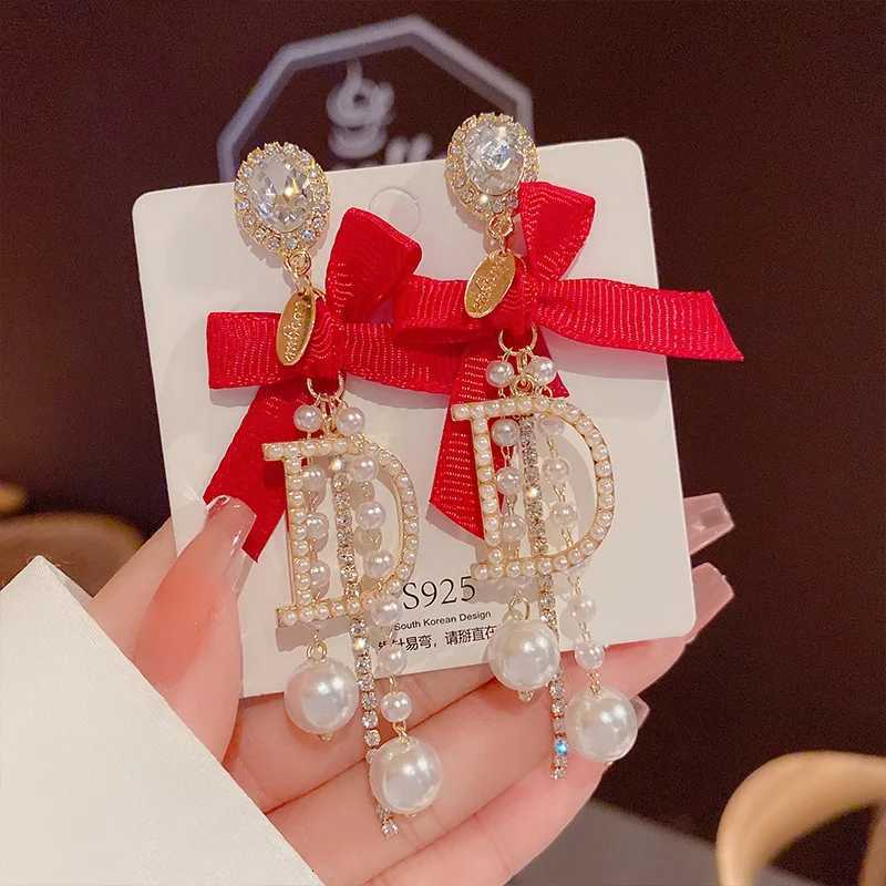 Celebrity tassel pearl earrings High class temperament earrings Long personty bow exaggerated earrings Sp Girl Y251210
