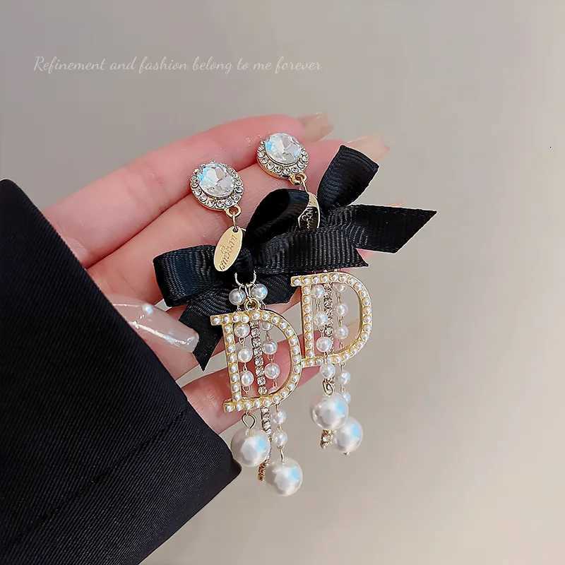 Celebrity tassel pearl earrings High class temperament earrings Long personty bow exaggerated earrings Sp Girl Y251210