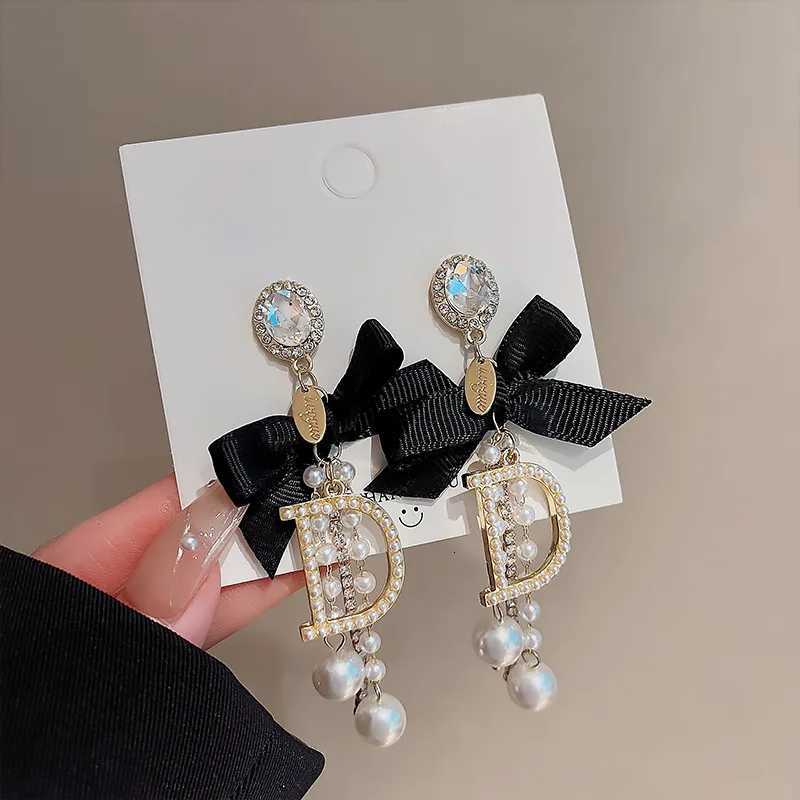 Celebrity tassel pearl earrings High class temperament earrings Long personty bow exaggerated earrings Sp Girl Y251210