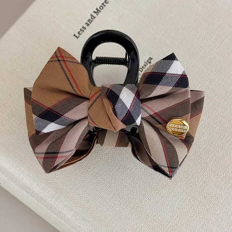 1pc/2pcs autumn and winter new British contrast plaid bow grip classic vintage fabric shark clip on the back of the Y251210