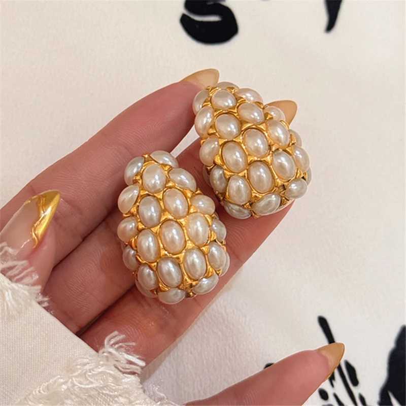 New hollow water drop imitation pearl earrings Fashionable and simple golden ladies banquet exquisite gift Y251210
