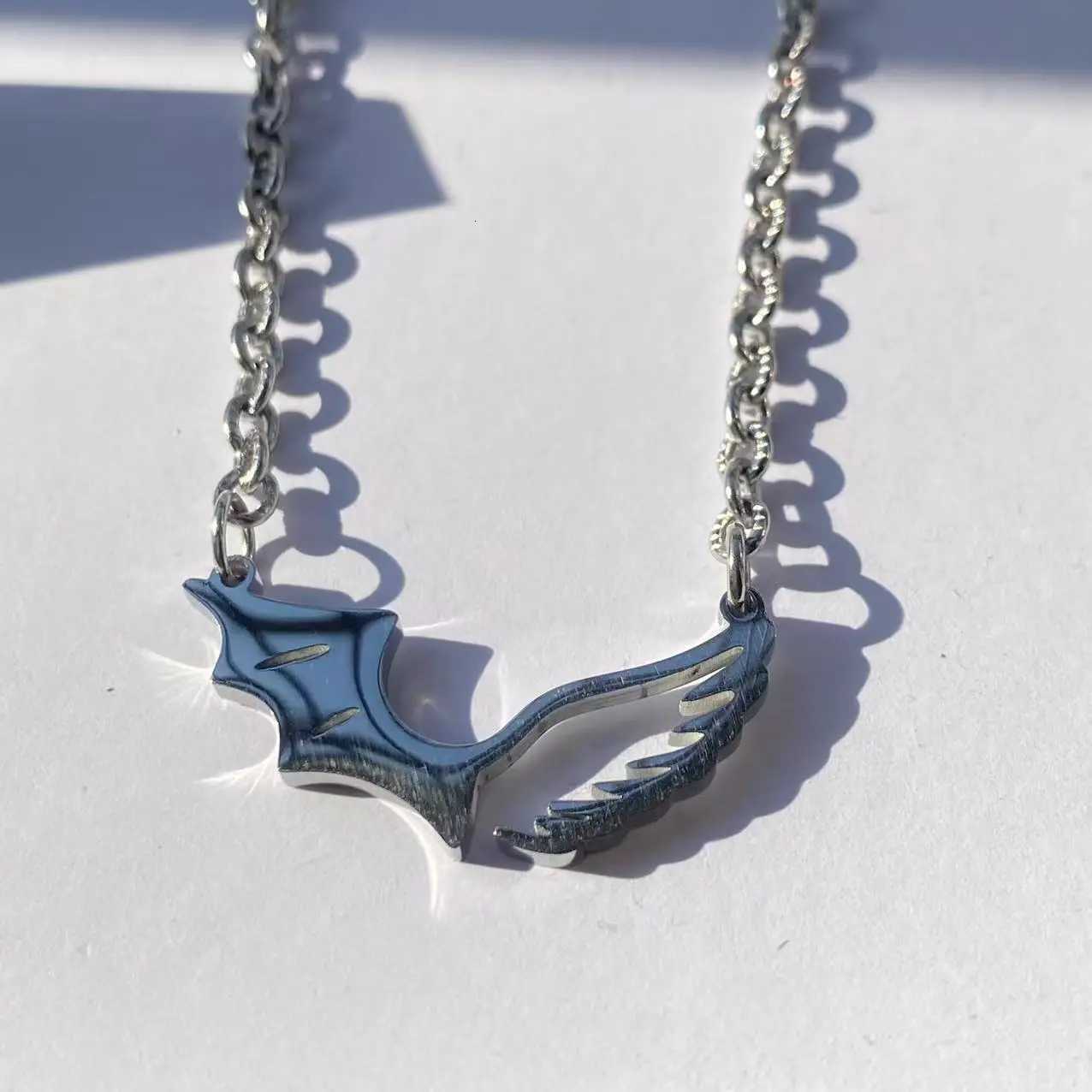 High-quality Stainless Steel Angel and Devil Wings Pendant Necklace Personalized Design Hip-Hop Mens and Womens Gift Necklace M251211