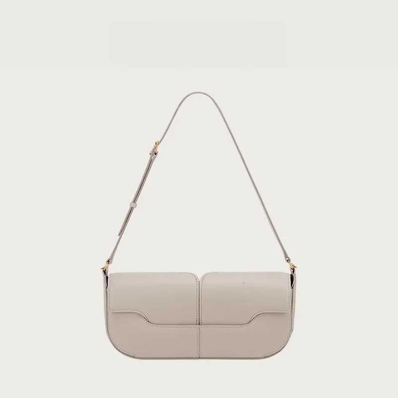 French Luxury and Fiable e Shoder Underarm Handbag Cowhide Cmuting Handbag Casual and Simple French Stick Bag Y251211